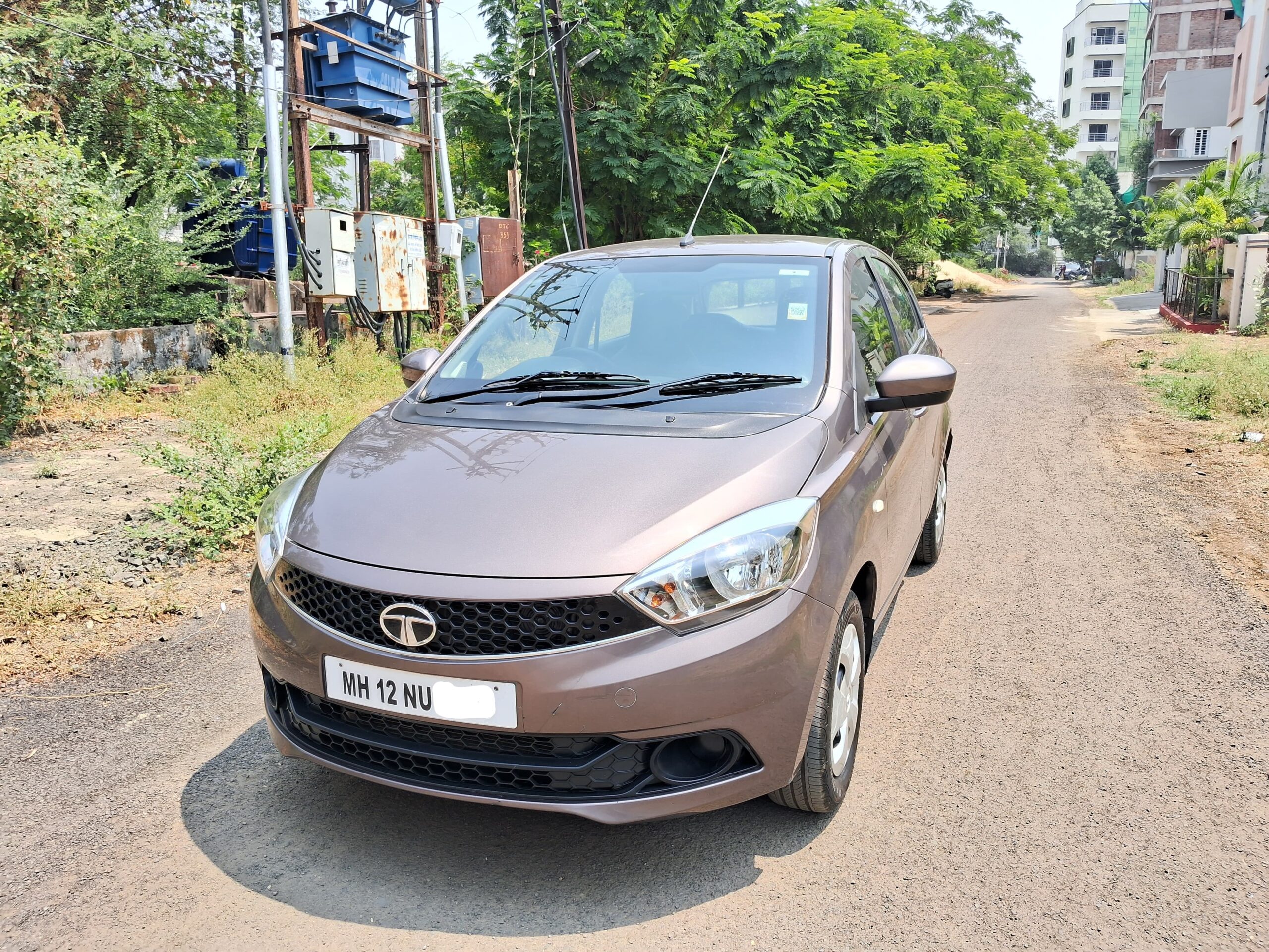 
								Tata Tiago XT (Petrol) – February 2017 full									